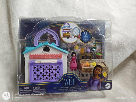 Wish toy set featuring a colorful market stall, character figures, and accessories for imaginative play.