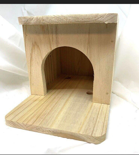 Wooden Cat House features a cozy arch entrance and natural wood finish.
