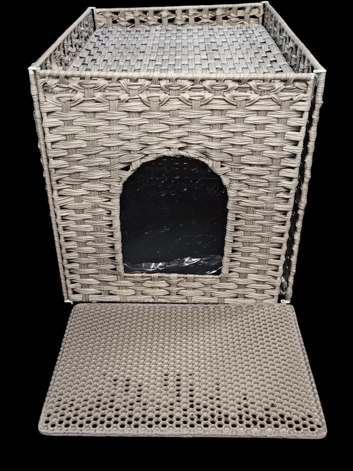 Woven storage basket with an open front and removable mat, perfect for organizing spaces.