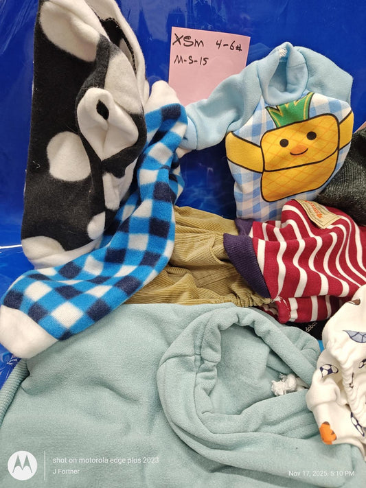 XSM 4-6x pajamas featuring a cheerful cheese character and various colorful patterns.