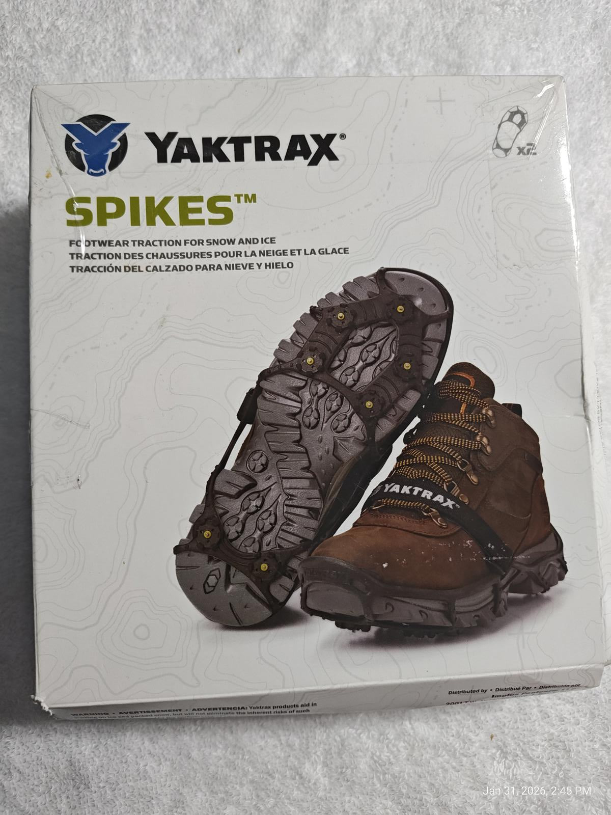 Yaktrax Spikes for enhanced traction on icy surfaces, featuring durable design and easy attachment.