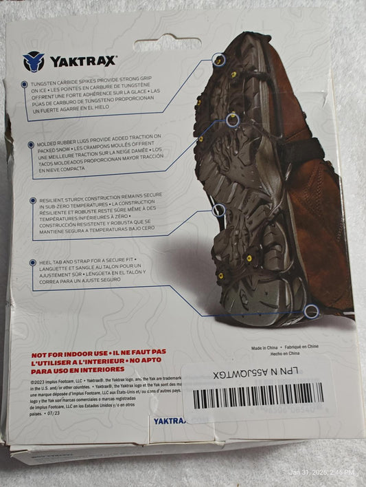 Yaktrax traction cleats designed for outdoor use, featuring durable rubber and metal spikes for enhanced grip.