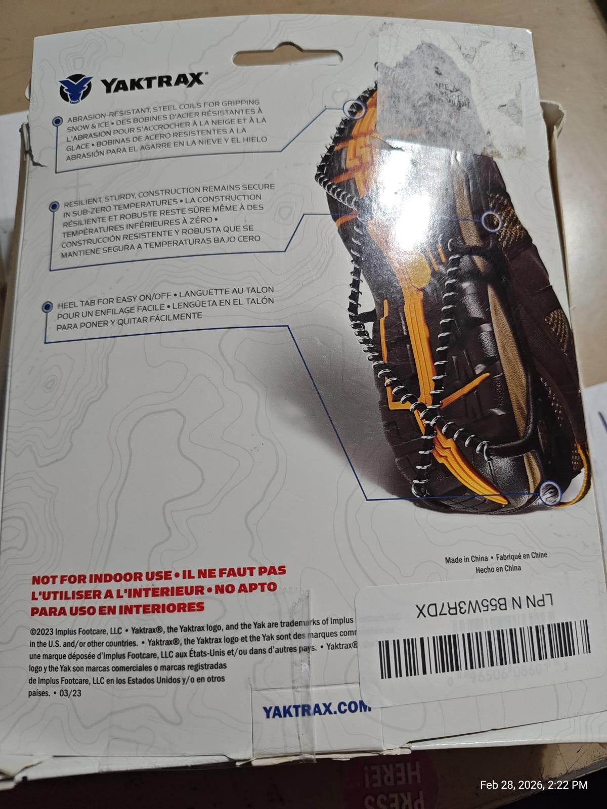 Yaktrax traction device for winter use, featuring durable spikes and a secure fit.