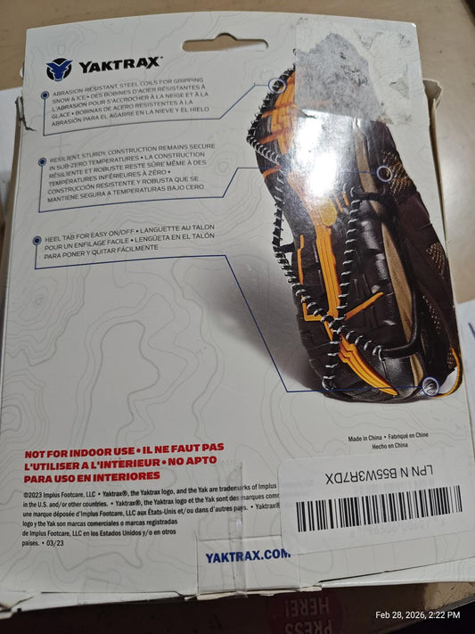 Yaktrax traction device for winter use, featuring durable spikes and a secure fit.