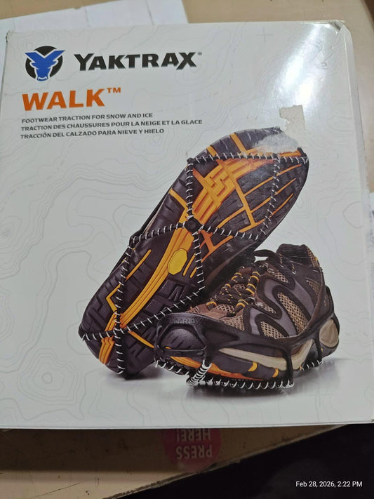 Yaktrax Walk traction device for shoes, featuring a durable design with rubber and metal spikes for winter grip.
