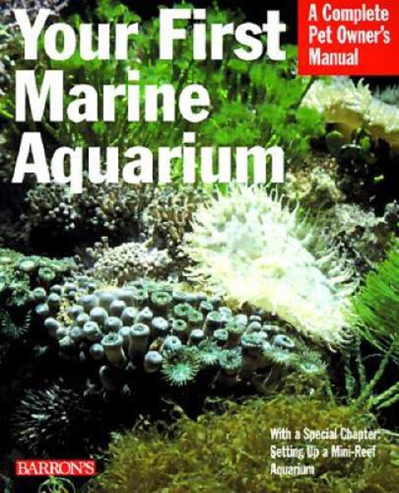 Your First Marine Aquarium book cover featuring vibrant coral and marine life.