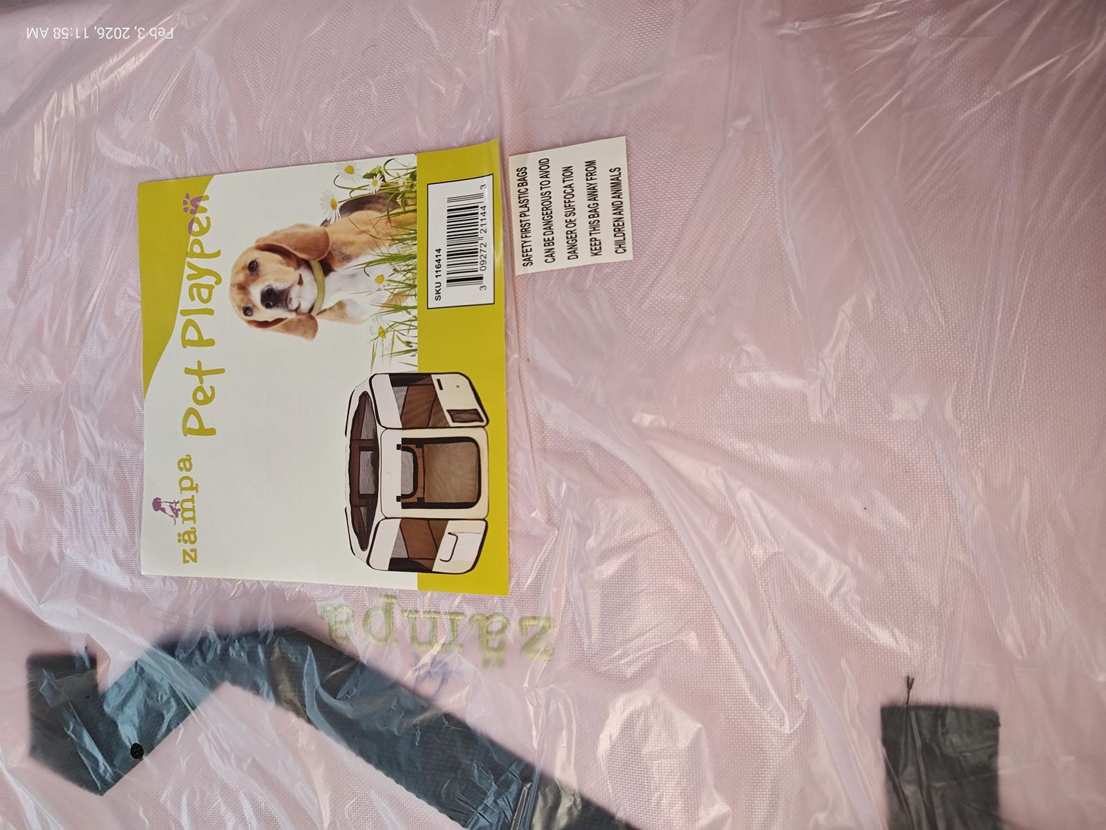 Zampa Pet Playpen in pink color, featuring a foldable design for easy setup.