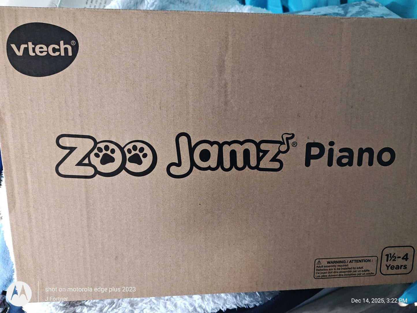 Zoo Jamz Piano box featuring playful design and VTech branding for kids aged 1-4 years.