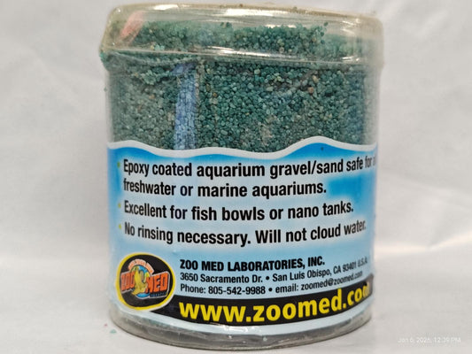 Zoomed aquarium gravel in a clear container, ideal for freshwater or marine aquariums.